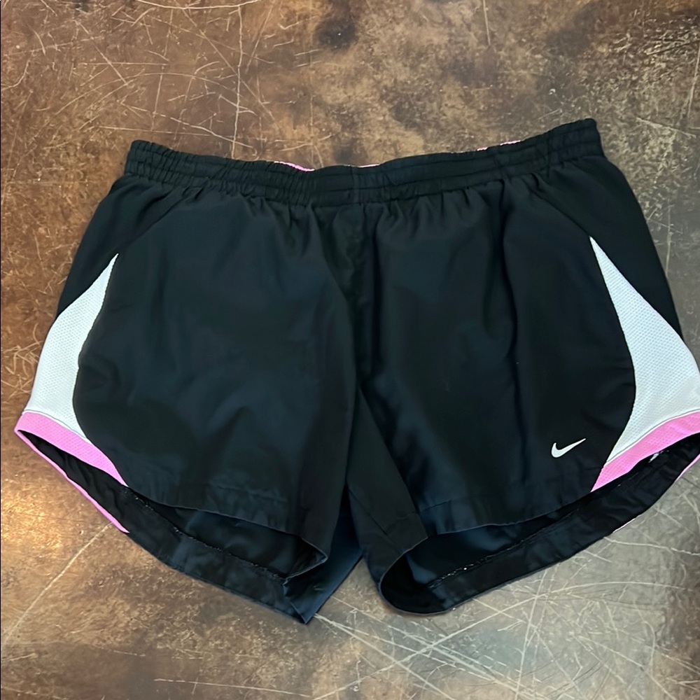 Women’s Nike running shorts black with white and pink. Size large